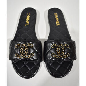 Chanel 23P Black Chain Gold CC Logo Quilted Mules Slide Sandal Slip On Flat 38